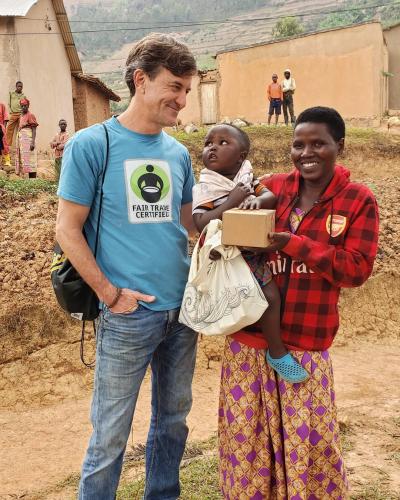 Fair Trade USA Founder & CEO Paul Rice meets with Fair Trade tea pluckers on a recent trip to Rwanda.