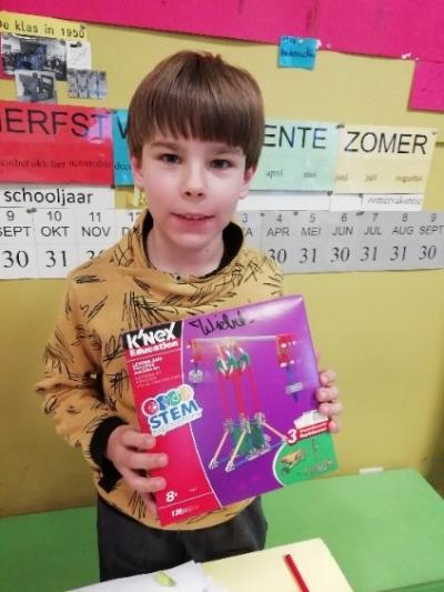 A student shows off his STEM Kit. Photo Courtesy of DeBroeBELschool.