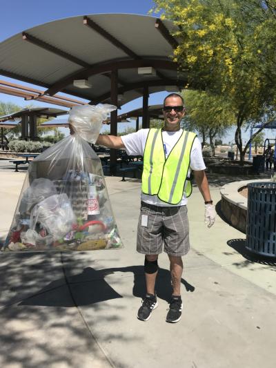 More than 20 AEG Facilities employees from Gila River Arena participate in a park cleanup at Grand Canal Linear Park and Glendale Heroes Regional Park in Glendale, Ariz. for Earth Day on April 22, 2019.