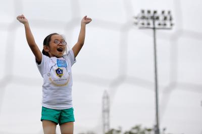 Special Olympics Southern California Youth Athletes Festival participant from Santa Ana Unified School District, celebrates after scoring a goal at AEG's StubHub Center in Carson, Calif. on Friday, Aug. 25, 2017.