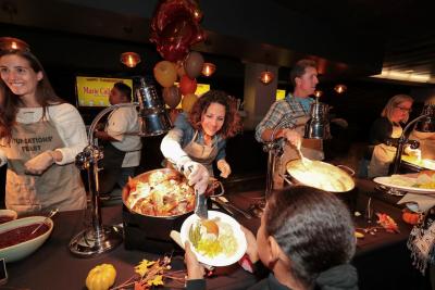 Dignity Health Sports Park General Manager Katie Pandolfo serves more than 200 meals to children and families during the 16th Annual Thanksgiving Foundations’ Feast at Dignity Health Sports Park’s American Express Club on Friday, Nov. 22, 2019.