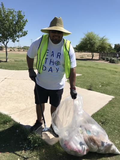 More than 20 AEG Facilities employees from Gila River Arena participate in a park cleanup at Grand Canal Linear Park and Glendale Heroes Regional Park in Glendale, Ariz. for Earth Day on April 22, 2019.