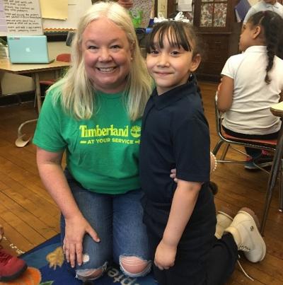 Timberland employee, Jill Holt, enjoys meeting her TutorMate student for the first time after ten weeks of tutoring the student online through the TutorMate platform.