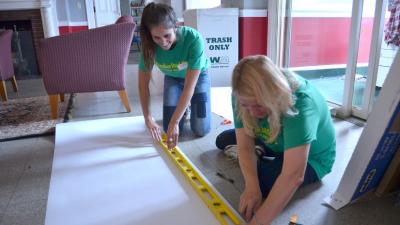 Timberland Serv-a-Palooza volunteers sorted donated items for a resale boutique and made interior improvements to benefit the YWCA and Family Justice Center, which share a location and respectively provide comprehensive services for women, children and families, and offer support and services to victims of domestic violence, sexual assault, and stalking.