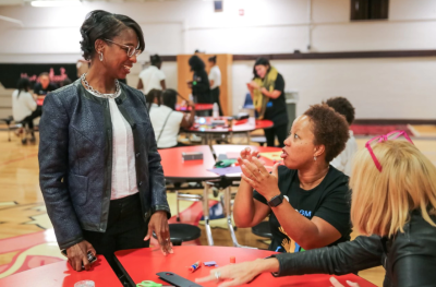 General Motors Executive Vice President Global Manufacturing Alicia Boler Davis talks with 2nd - 6th grade students at Detroit International Academy Tuesday, September 12, 2017 during a STEM-focused activity in celebration of the GM - Black Girls Code partnership and the launch of a Detroit chapter in Detroit, Michigan. (Photo by John F. Martin for General Motors)