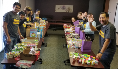 In addition to a zero-tolerance policy through the company's value chain, another way Symantec addresses human trafficking and domestic violence is through community engagement and employee volunteering. Here Symantec volunteers at NextDoor Solutions, one