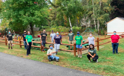 Timberland employee volunteers for the company’s 23rd annual Serv-a-palooza keep a safe social distance while serving Seacoast Family Promise, a community shelter for people experiencing homelessness. Volunteers painted, landscaped, and worked on the playground.
