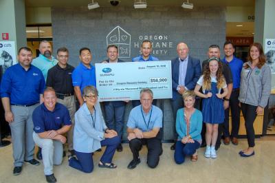 Subaru of America, Inc. and Portland Metro retailers (Carr Subaru, Dick Hannah Subaru, Gresham Subaru, Lithia Oregon City Subaru, Royal Moore Subaru, Wentworth Subaru and Wilsonville Subaru) donated nearly $57,000 to the Oregon Humane Society as part of the automaker’s Subaru Loves Pets initiative. Pictured, left to right: (back row) Paul Heinrich, Val Brown, Ward Preble, Jason Hirata, Jim Pernas, Kamal Chaer, Peter Holt, James Lee, Addison Lee, Doug Wentworth, Hannah Walter; (front row): Michael Parks, Jane Morrison, Jeff Doughty, Rhonda Pfeifer.