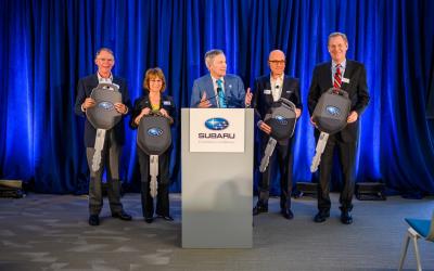 Richard Davis (left), Ellie Hollander, Tom Doll, Matt Bershadker, and Will Shafroth wrap-up the 2018 Subaru Share the Love Event with ceremony at Subaru of America, Inc. headquarters, Camden, NJ on April 3, 2019. Doll makes a surprise announcement revealing an additional donation of an all-new vehicle to each of the four national charity partners.