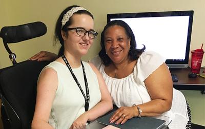 Tech Coaching Center participant Samantha with The Arc Southern Maryland Vocational Support Professional Tecora Evans.