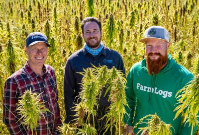 Mark Vollmar (Vollmar Family Farms), Chad Rosen (Victory Hemp Foods), and Jordan Vollmar (Vollmar Organics) at Vollmar Family Farms in Caro, Michigan.