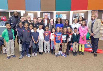 Staff and volunteers from United Way of Greater Philadelphia and Southern New Jersey, Subaru, Forest Hill Elementary School and Camden County Police joined Forest Hill students at a ribbon cutting on March 5, 2019, to celebrate a new reading oasis and addition of more than 400 new books to the school’s library. The reading oasis, which was installed by Subaru volunteers in partnership with United Way, was unveiled as part of United Way’s Read Across America Week celebration.