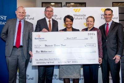 The SunTrust Foundation presents a $5 million grant to the Westside Future Fund to support affordable housing and economic development. Left to right: John Ahmann, Executive Director of Westside Future Fund; Bill Rogers, Chairman & CEO of SunTrust and SunTrust Foundation Chairman of the Board; Atlanta Mayor Keisha Lance Bottoms; Dr. Beverly Tatum, Westside Future Fund Vice Chairman; Richard Dugas, Westside Future Fund Chairman