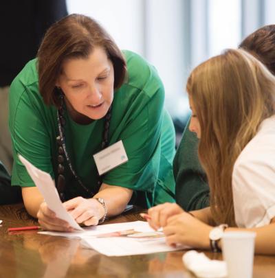 Stephanie Williams in Associate Experience and Communications, with students from South Sydney High School