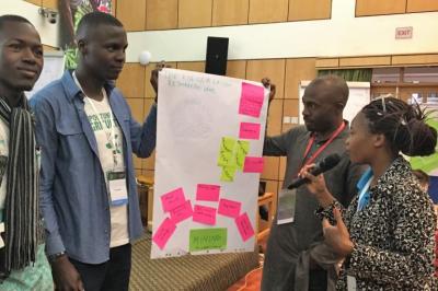 This is how we create a movement: youth delegates (from left) John Agboola, Alugnoa Desmond, Lawrence Afere and Joy Abraham. Photo: Cathy Watson/World Agroforestry Centre