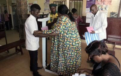 A patient is being weighed at the Etoug-Ebe Baptist Hospital, one of the 88 health facilities run by the Cameroon Baptist Convention (CBC). As part of the partnership with Novartis Access, CBC health services has launched the Know Your Numbers campaign to encourage individuals to know their critical health numbers such as weight and blood pressure.