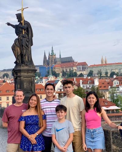 Rick Truscott (let), Chief Operating Officer of CLP Power Hong Kong Limited, enjoys a holiday in Prague with his family and says moments like these are “the reason I work“.