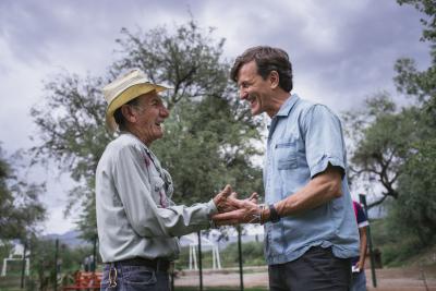 Fair Trade USA's founder and CEO Paul Rice visits a farmer at Wholesum Harvest's Fair Trade Certified produce farm in Arizona.