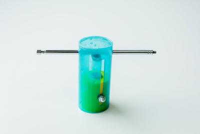 A polished prototype of the Water Level Sensor Buddy, a device that helps the visually impaired measure water levels using a mechanical, magnet-based design.