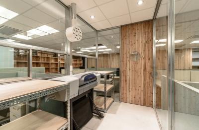 Separate rooms for printers prevents noise disruption and ensures unwanted air pollutants don’t travel into the open office areas.