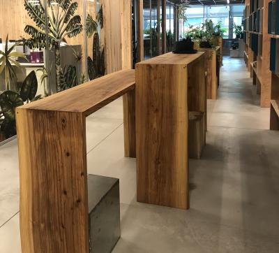 Standing workstations with two adjustable heights were placed in the main corridor where employees are able to conduct quick meetings, collaborate and view drawings and products with clients.