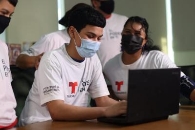 Danny Alvarado, a freshman at Raul Yzaguirre Schools for Success, shared with his family a school project he’s been working and the benefit to having access to a laptop and internet at home.