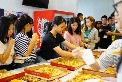 Free pizzas were served during Timberland’s first annual onsite Career Day. Timberland employees were encouraged to mingle with the students who attended the event.