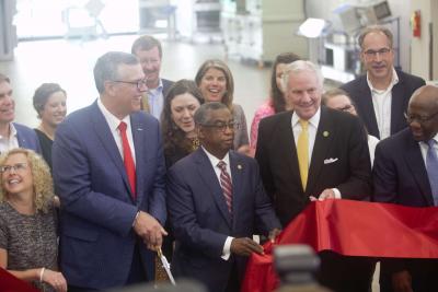 Donny Simmons, president, Trane Commercial HVAC North America and EMEA, front row, second from left, cuts the ribbon on our newly-expanded Columbia facility. From left to right: Ted Pitts, South Carolina Chamber of Commerce; Kim Mann, Richland County Economic Development; Morgan Harrell, Dominion Energy; Donny Simmons, president, Trane Commercial HVAC North America and EMEA; Kent Bedenbaugh, Ready SC; Briana Bateman, US Senator Tim Scott’s Office; South Carolina Senator John L. Scott Jr.; Tiffany Harrison, Richland County Economic Development; Governor Henry McMaster; Brian Westfall; vice president, advanced manufacturing; Paul Livingston, Richland County Council Chairman.