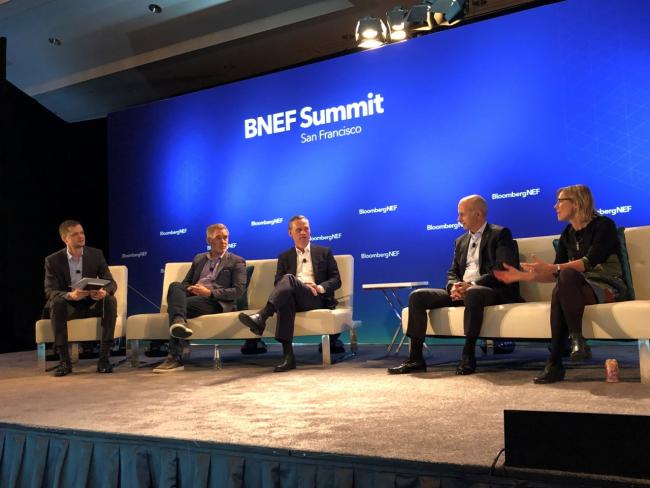 Edison International Senior VP for Strategy and Corporate Development Drew Murphy (center) discusses business models for EV charging at Bloomberg’s Future of Mobility Summit in San Francisco.