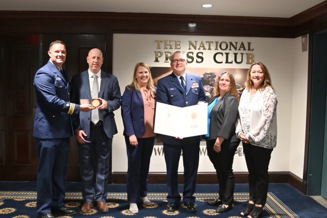 Marathon Petroleum employees receiving award from U.S. Coast Guard
