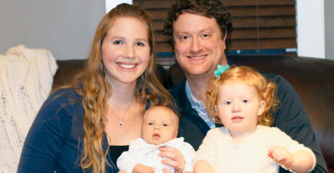 Bristol-Myers Squibb employees Heather and Ryan Fischer and their children Colette, left, and Adelaide