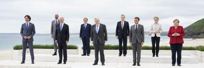 Leaders of the G7 pose for a group photo on overlooking the beach at the Carbis Bay Hotel in Carbis Bay, St. Ives, Cornwall, England, Friday, June 11, 2021. Patrick Semansky/Pool/AP