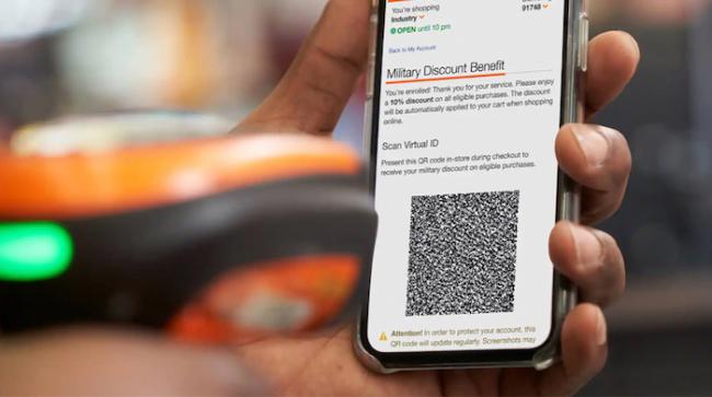 iPhone shown with the Home Depot app for Military Veterans discount.