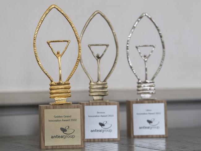 three award trophies