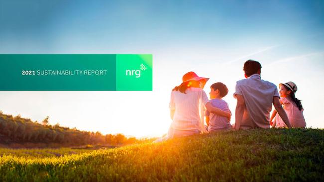 NRG Energy 2021 Sustainability Report: Family sitting on a hill watching the sunset.