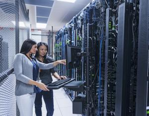 Women working in front of computer servers