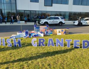 Eight-year-old Antonio of Camden, NJ received the surprise of a lifetime – a fleet of Subaru vehicles, led by a Camden County Police Department escort, drove past his home, each car carrying gifts. Photo credit: Camden County Police Department