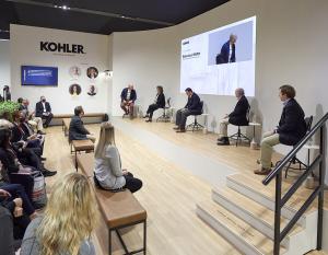 panel of speakers with audience