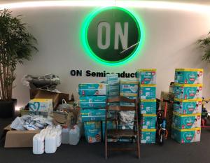 ON Semiconductor’s Joseph Notaro, vice president of worldwide automotive strategy and business development, delivered donations and an oversized check in December 2020 to Agnes Gschwendtner, facility manager of Salberghaus.