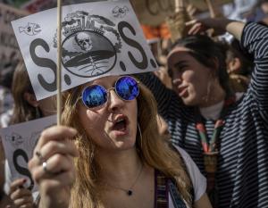 Students shout slogans during a rally in Madrid, Spain, on March 15, 2019. Students mobilized by word of mouth and social media skipped class to protest what they believe are their governments' failure to take tough action against global warming. | Students shout slogans during a rally in Madrid, Spain, on March 15, 2019. Students mobilized by word of mouth and social media skipped class to protest what they believe are their governments' failure to take tough action against global warming. | Bernat Armangu