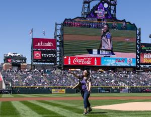 Genesis Rodriguez throwing the first pitch as part of the festivities