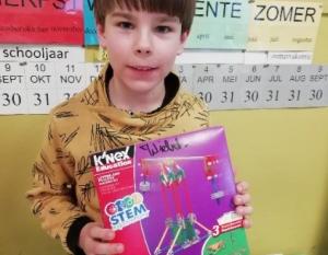 A student shows off his STEM Kit. Photo Courtesy of DeBroeBELschool.