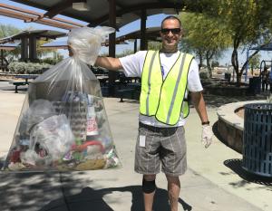 More than 20 AEG Facilities employees from Gila River Arena participate in a park cleanup at Grand Canal Linear Park and Glendale Heroes Regional Park in Glendale, Ariz. for Earth Day on April 22, 2019.