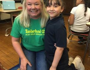 Timberland employee, Jill Holt, enjoys meeting her TutorMate student for the first time after ten weeks of tutoring the student online through the TutorMate platform.