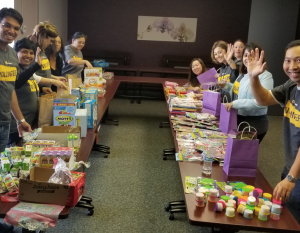 In addition to a zero-tolerance policy through the company's value chain, another way Symantec addresses human trafficking and domestic violence is through community engagement and employee volunteering. Here Symantec volunteers at NextDoor Solutions, one