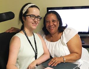 Tech Coaching Center participant Samantha with The Arc Southern Maryland Vocational Support Professional Tecora Evans.