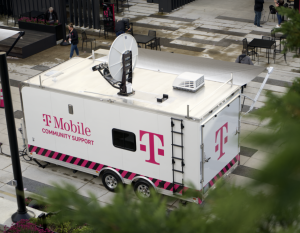 trailer with satellite dish and tmobile logo