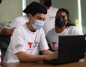 Danny Alvarado, a freshman at Raul Yzaguirre Schools for Success, shared with his family a school project he’s been working and the benefit to having access to a laptop and internet at home.