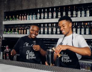 two men behind the bar