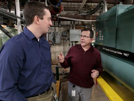 Duke Energy's Andrew Taylor, left, and the hospital's Jeff Mace.